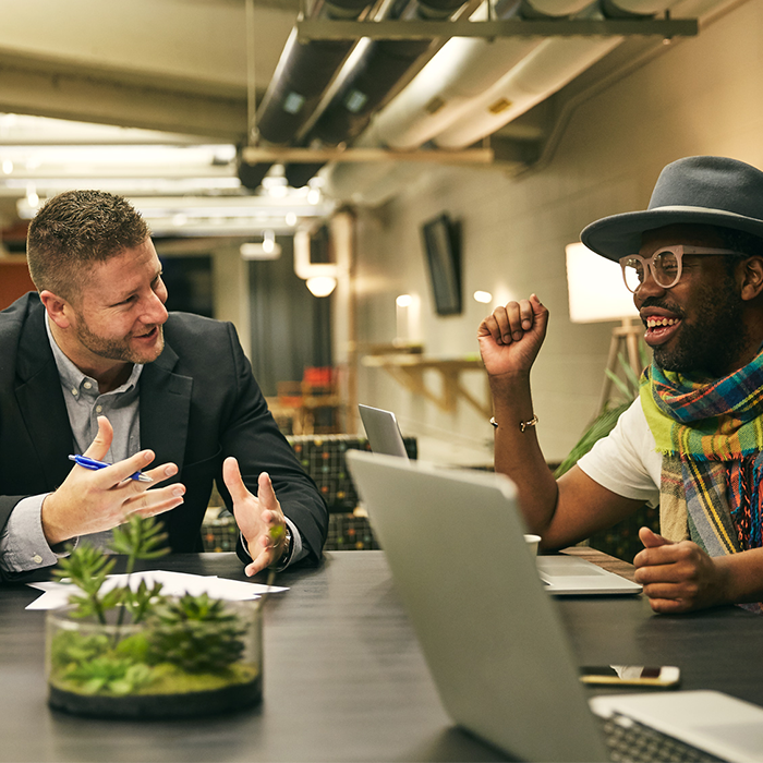 Two business owners at table