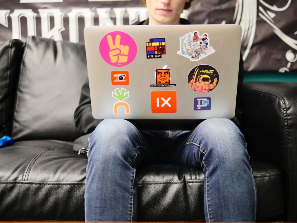 student employee working on laptop