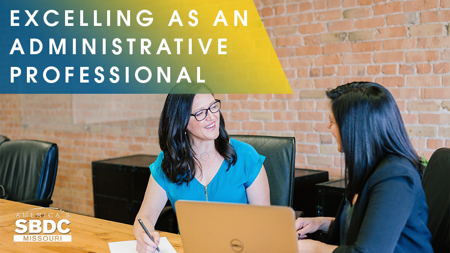 Excelling as an Administrative Professional written on picture of two women talking at laptop.