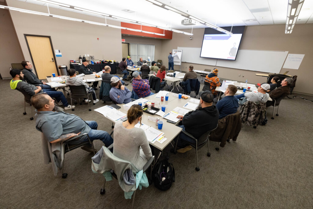 Full conference space as a presenter teaches a course.