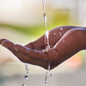 water running in hand and overflowing