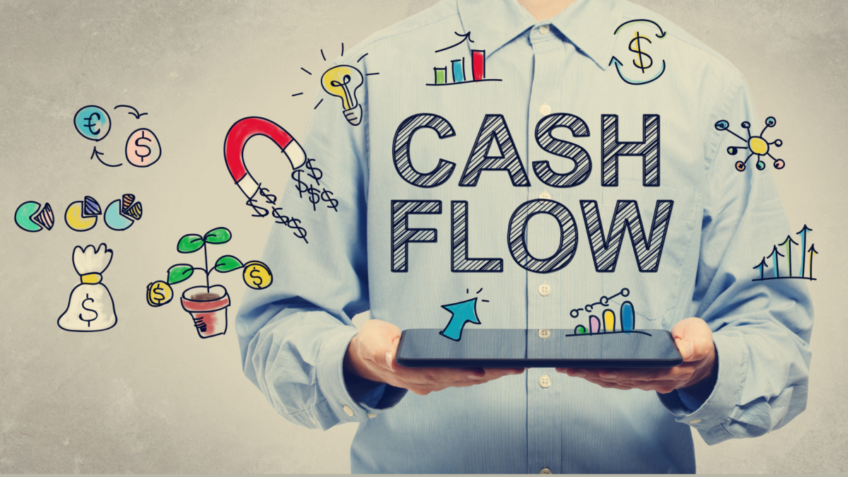 Cash Flow concept with young man holding a tablet computer.