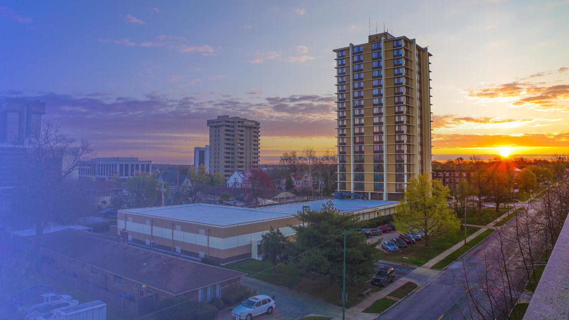 Picture of Sunvilla Tower on the Missouri State University campus with downtown Springfield, Missouri in the background.