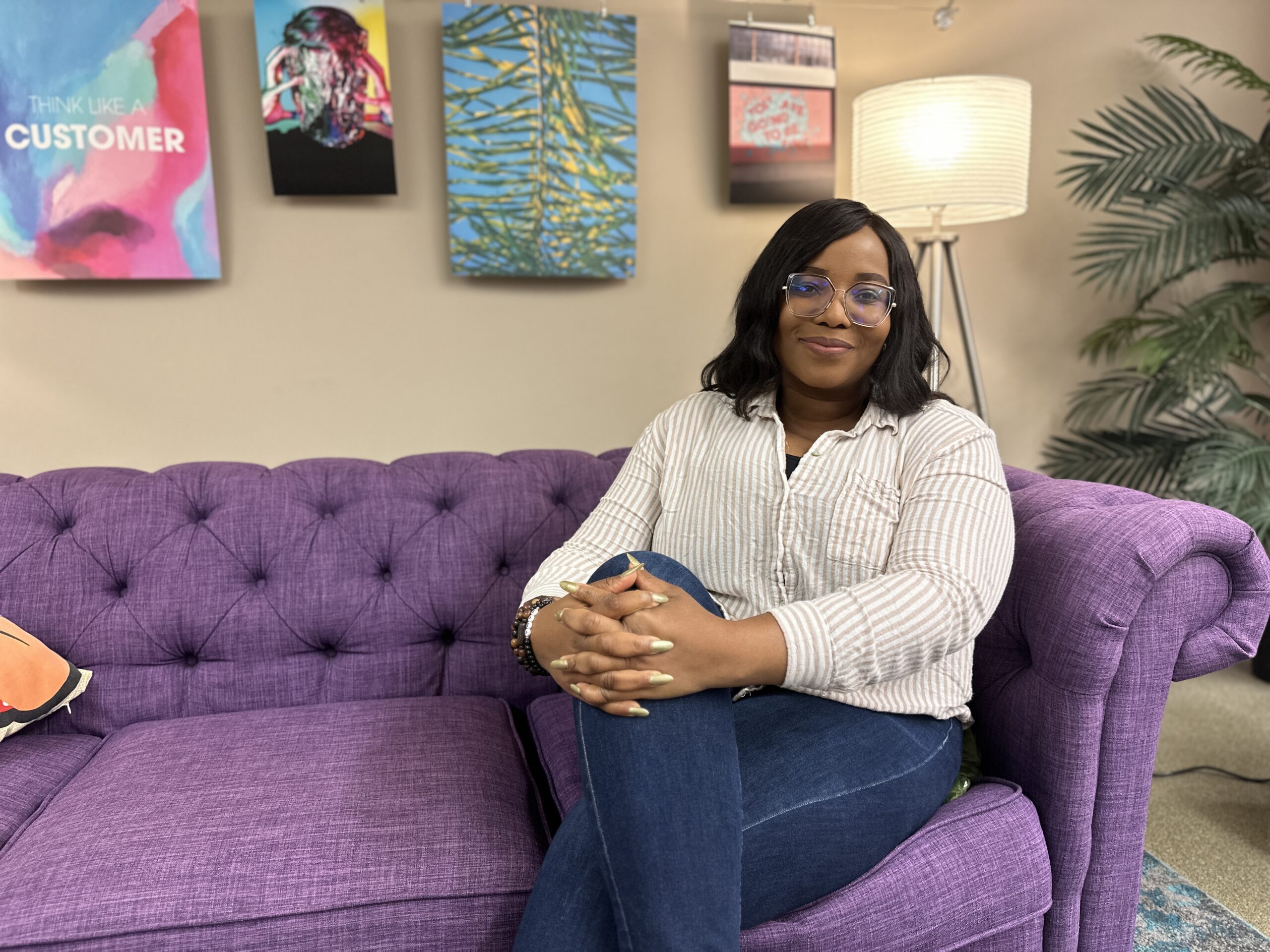 Dami Odunewu, founder of Purpose Connect, poses in coworking