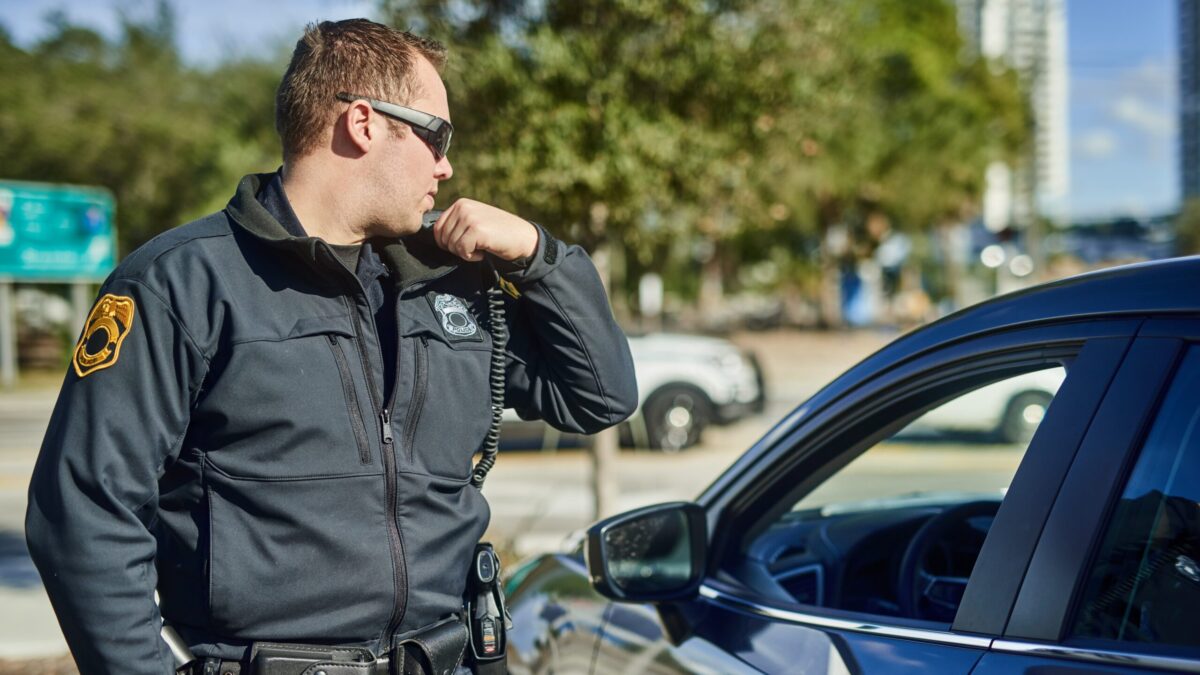 officer on radio calling for backup