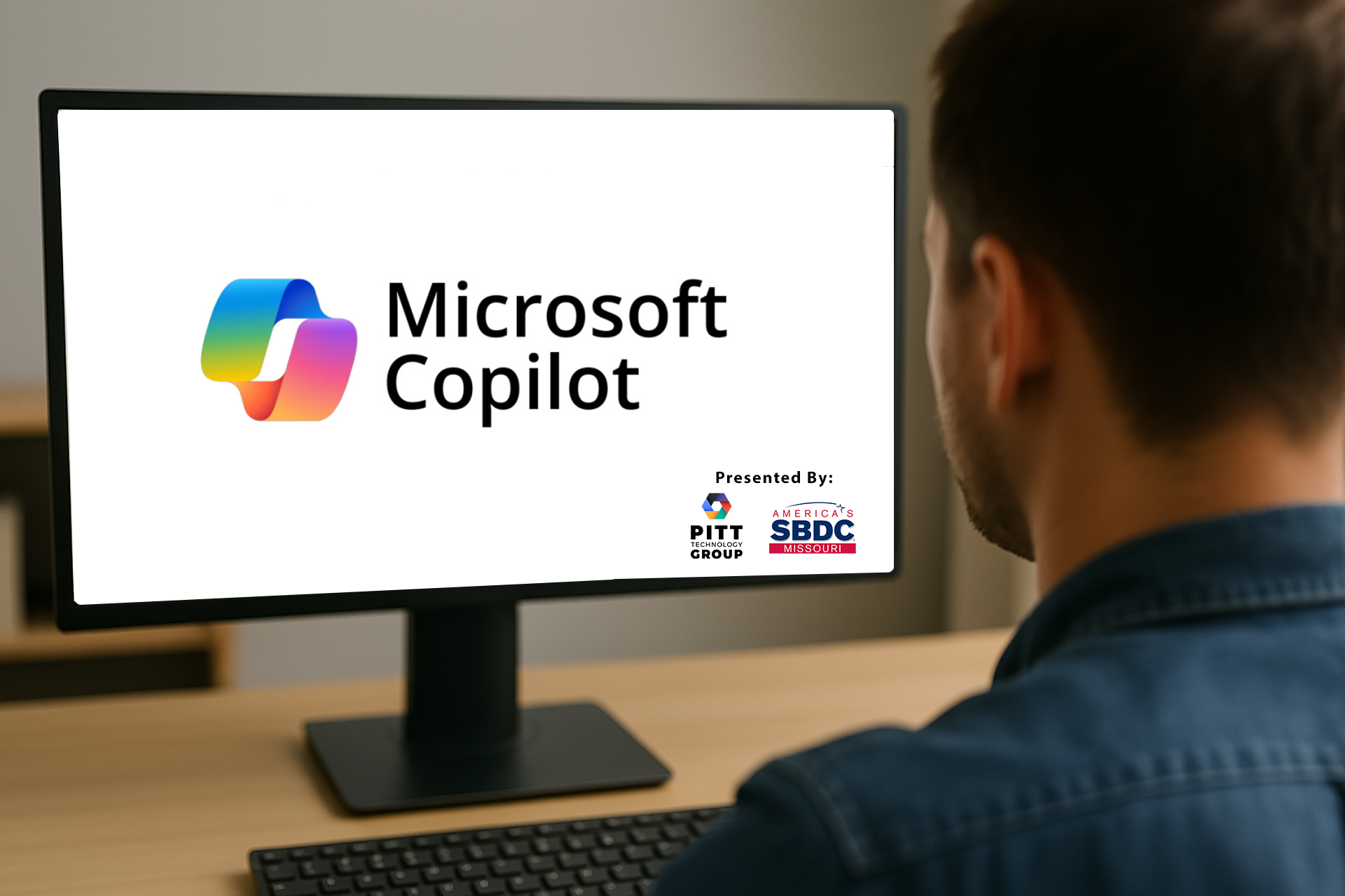 Man sitting in front of a computer screen with Microsoft Copilot logo on the screen. Pitt Technology Group and Missouri SBDC logos are featured as the presenting sponsors.