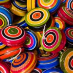 Pile of brightly colored yo-yos