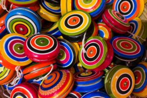Pile of brightly colored yo-yos