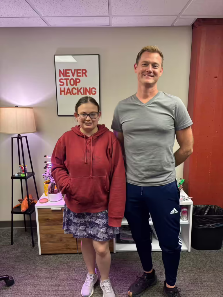 Elise and Chad stand in office