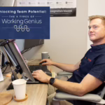 Man sitting at his work desk looking a text box that reads "Unlocking Team Potential: The 6 Types of Working Genius" and has the Working Genius logo.