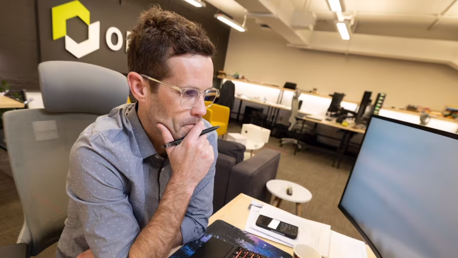 Man studies his computer