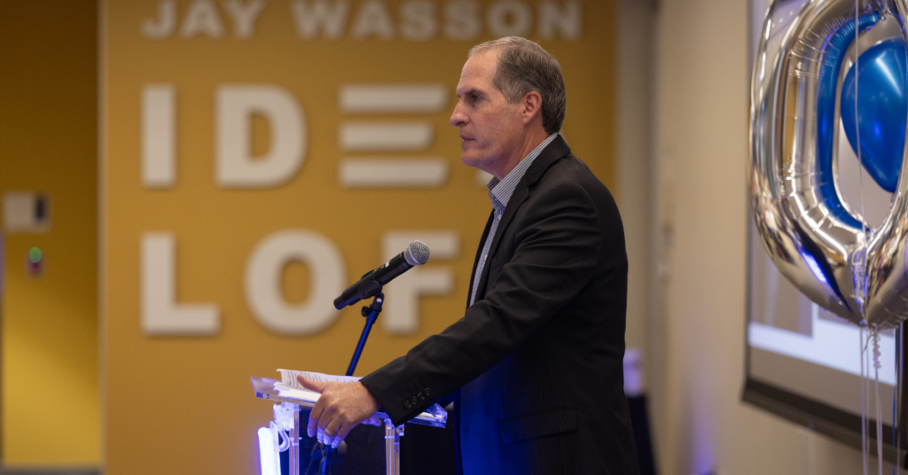 Allen Kunkel at podium