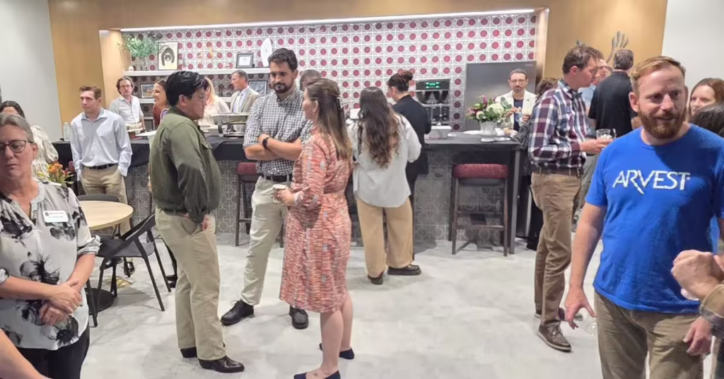 People gather in coffee area networking event